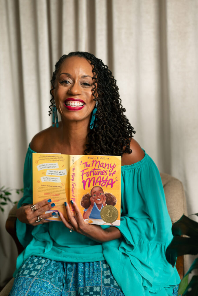 Nicole Collier Harp, a smiling Black woman. She's a developmental editor and coach available to hire at cocostudio.